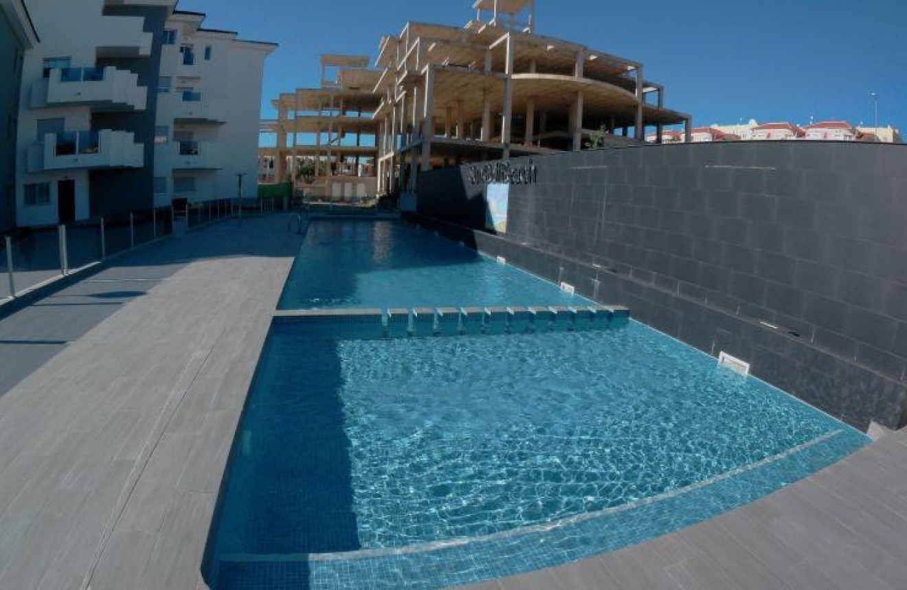 Obra nueva - Apartamento / piso -
Orihuela Costa - Las Filipinas